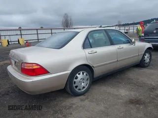 2000 Acura RL with VIN JH4KA9657YC008473, listed as a IAAI auction lot 41935155 with 216,629 mi miles. Bid and sale history available at carsss.com. Image 4.
