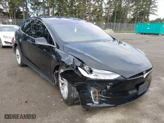 2016 Tesla Model X 70D with VIN 5YJXCBE20GF013046, listed as a IAAI auction lot 41944005 with 94,509 mi miles. Bid and sale history available at carsss.com. Image 1.