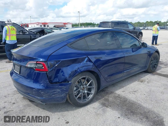 2022 Tesla Model 3 with VIN 5YJ3E1EA4NF191808, listed as a IAAI auction lot 39564406 with 6,756 mi miles. Bid and sale history available at carsss.com. Image 4.