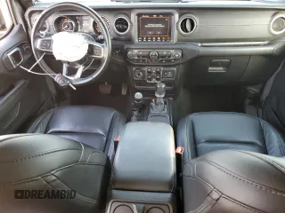 2019 Jeep Wrangler Unlimited Sahara with VIN 1C4HJXEN0KW616942, listed as a Copart auction lot 63501755 with 57,095 mi miles and Salvage title. Bid and sale history available at DreamBid. Image 8.