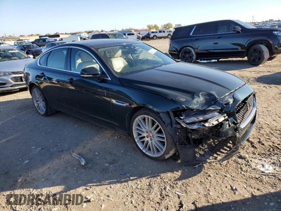 2017 Jaguar XF 35t Prestige with VIN SAJBE4BV2HCY34812, listed as a Copart auction lot 82416134 with 56,955 mi miles and Salvage Title. Bid and sale history available at carsss.com. Image 4.