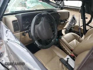 1999 Jeep Wrangler SE with VIN 1J4FY29P7XP484551, listed as a Copart auction lot 86881094 with 0 mi miles and Salvage Title. Bid and sale history available at carsss.com. Image 8.
