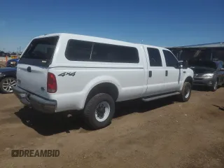 2004 Ford F-250 XL with VIN 1FTNW21L94EC37720, listed as a Copart auction lot 55412095 with 145,255 mi miles and Salvage title. Bid and sale history available at DreamBid. Image 3.