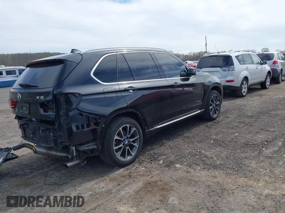 2017 BMW X5 xDrive35i with VIN 5UXKR0C31H0V78672, listed as a IAAI auction lot 42084958 with 95,782 mi miles and . Bid and sale history available at DreamBid. Image 4.
