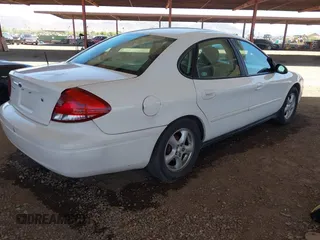 2004 Ford Taurus SE with VIN 1FAFP53U84A182327, listed as a IAAI auction lot 42284327 with Not provided miles and . Bid and sale history available at DreamBid. Image 4.