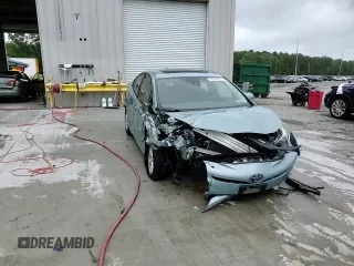 2016 Toyota Prius Four z VIN JTDKARFU1G3006158, wystawiony jako Copart lot #56500265 z przebiegiem 57 418 mil mil oraz Szkoda całkowita • Salvage title. Historia ofert i sprzedaży dostępna na DreamBid. Obrazek 14.