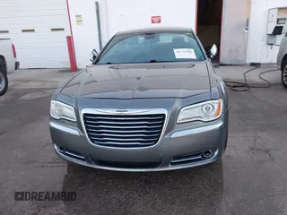 2011 Chrysler 300 with VIN 2C3CA6CTXBH580203, listed as a IAAI auction lot 41751968 with 173,916 mi miles. Bid and sale history available at carsss.com. Image 6.