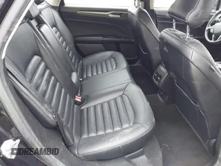 2019 Ford Fusion Hybrid SEL with VIN 3FA6P0MU1KR202860, listed as a IAAI auction lot 41983299 with 133,671 mi miles. Bid and sale history available at carsss.com. Image 8.