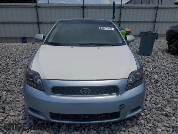 2006 Scion tC z VIN JTKDE167560101159, wystawiony jako Copart lot #58065315 z przebiegiem 136 428 mil mil oraz Szkoda całkowita • Salvage title. Historia ofert i sprzedaży dostępna na DreamBid. Obrazek 5.