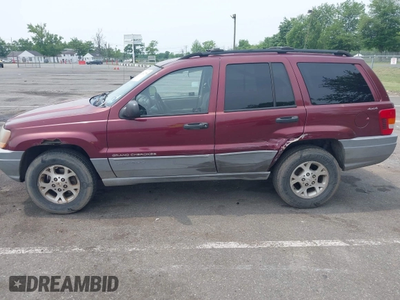2000 Jeep Grand Cherokee Laredo z VIN 1J4GW48S2YC288439, wystawiony jako IAAI lot #42492798 z przebiegiem 272 527 mil mil oraz . Historia ofert i sprzedaży dostępna na DreamBid. Obrazek 6.