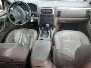 2003 Jeep Grand Cherokee Laredo z VIN 1J4GW48S73C523300, wystawiony jako Copart lot #73612503 z przebiegiem 109 570 mil mil oraz Nie do naprawy • Non repairable. Historia ofert i sprzedaży dostępna na DreamBid. Obrazek 8.