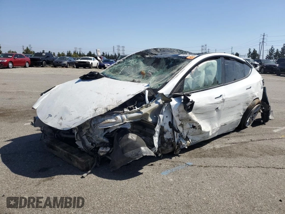 2023 Tesla Model Y Long Range z VIN 7SAYGDEE3PA077841, wystawiony jako Copart lot #54535215 z przebiegiem Nie podano mil oraz Szkoda całkowita • Salvage title. Historia ofert i sprzedaży dostępna na DreamBid. Obrazek 1.