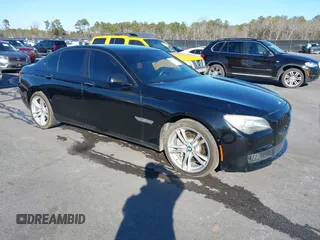 2012 BMW 7 Series 750i with VIN WBAKA8C54CDS99708, listed as a IAAI auction lot 41447371 with 67,355 mi miles. Bid and sale history available at carsss.com. Image 1.