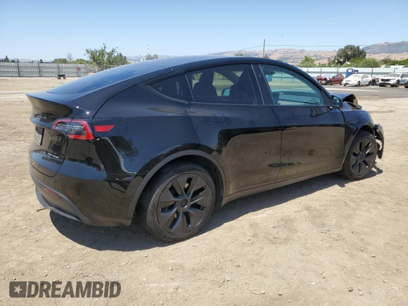 2024 Tesla Model Y Long Range with VIN 7SAYGAEE9RF125458, listed as a Copart auction lot 59567365 with 28,966 mi miles and Salvage title. Bid and sale history available at DreamBid. Image 3.