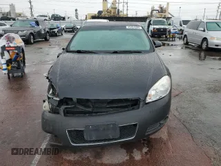 2012 Chevrolet Impala LTZ with VIN 2G1WC5E35C1317341, listed as a Copart auction lot 43404685 with 131,702 mi miles and Salvage Title. Bid and sale history available at DreamBid. Image 5.