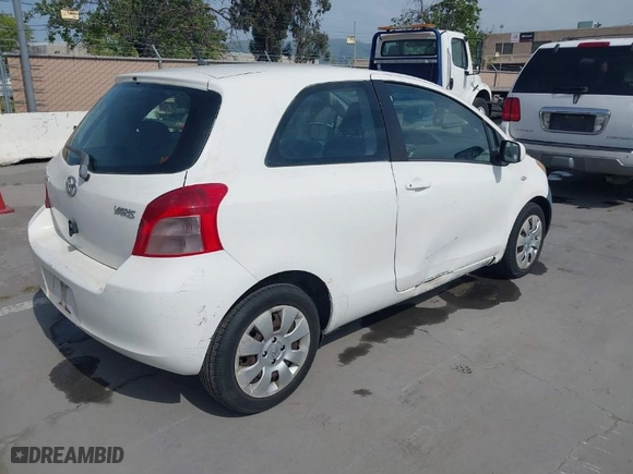 2007 Toyota Yaris with VIN JTDJT923875108158, listed as a IAAI auction lot 42055807 with 248,741 mi miles. Bid and sale history available at carsss.com. Image 4.