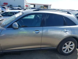 2005 Infiniti FX35 with VIN JNRAS08U55X109879, listed as a IAAI auction lot 42006420 with 150,760 mi miles. Bid and sale history available at carsss.com. Image 14.