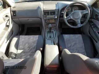 1999 Nissan Skyline z VIN HR34005885, wystawiony jako Copart lot #75422984 z przebiegiem 150 776 mil mil oraz Szkoda całkowita • Salvage title. Historia ofert i sprzedaży dostępna na DreamBid. Obrazek 8.