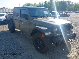 2020 Jeep Gladiator Sport S with VIN 1C6HJTAG0LL216406, listed as a IAAI auction lot 41991629 with 180,125 mi miles and . Bid and sale history available at DreamBid. Image 1.