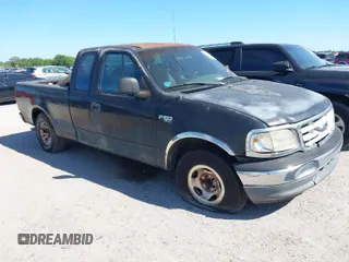1999 Ford F-150 with VIN 1FTZX1725XKA26611, listed as a IAAI auction lot 42037812 with Not Provided miles and . Bid and sale history available at DreamBid. Image 1.