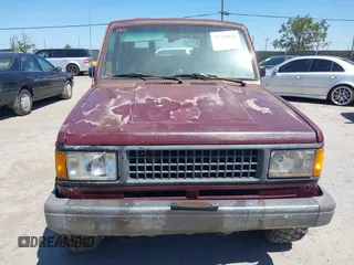 1991 Isuzu Trooper z VIN JACCH58R8M7904079, wystawiony jako IAAI lot #42303036 z przebiegiem 244 672 mil mil oraz . Historia ofert i sprzedaży dostępna na DreamBid. Obrazek 6.