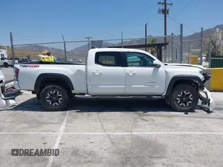 2021 Toyota Tacoma SR5 with VIN 3TMDZ5BN5MM118710, listed as a IAAI auction lot 42460278 with 60,310 mi miles and . Bid and sale history available at DreamBid. Image 13.