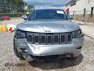 2017 Jeep Grand Cherokee Limited with VIN 1C4RJEBG4HC765329, listed as a IAAI auction lot 42008297 with 194,607 mi miles and . Bid and sale history available at DreamBid. Image 12.