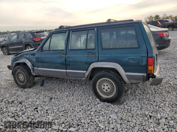 1996 Jeep Cherokee Country with VIN 1J4FJ78S7TL242853, listed as a Copart auction lot 73022554 with 84,868 mi miles and Salvage Title. Bid and sale history available at carsss.com. Image 2.