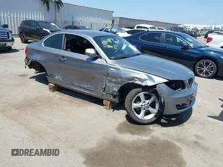 2011 BMW 1 Series 128i z VIN WBAUP9C58BVL89949, wystawiony jako IAAI lot #42086813 z przebiegiem 115 723 mil mil oraz . Historia ofert i sprzedaży dostępna na DreamBid. Obrazek 1.