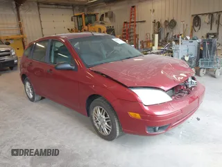 2005 Ford Focus S z VIN 3FAFP37NX5R109507, wystawiony jako IAAI lot #42107599 z przebiegiem 186 421 mil mil oraz . Historia ofert i sprzedaży dostępna na DreamBid. Obrazek 1.