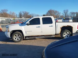 2009 Chevrolet Silverado 1500 LTZ with VIN 3GCEK33349G164495, listed as a IAAI auction lot 41311466 with 154,845 mi miles. Bid and sale history available at carsss.com. Image 14.