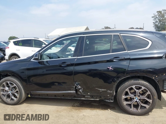 2021 BMW X1 sDrive28i with VIN WBXJG7C0XM5T45715, listed as a IAAI auction lot 42014499 with 23,793 mi miles and . Bid and sale history available at DreamBid. Image 15.