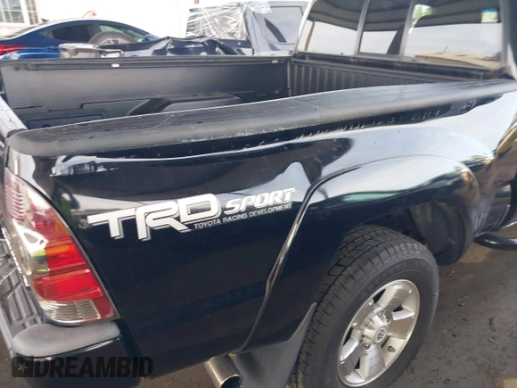 2015 Toyota Tacoma PreRunner with VIN 3TMKU4HNXFM046963, listed as a IAAI auction lot 41855850 with 39,213 mi miles and . Bid and sale history available at DreamBid. Image 6.