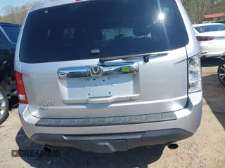 2013 Honda Pilot EX-L with VIN 5FNYF3H59DB022797, listed as a IAAI auction lot 41880675 with 206,359 mi miles and . Bid and sale history available at DreamBid. Image 16.