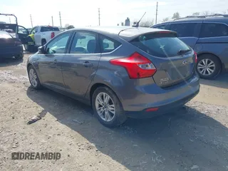 2012 Ford Focus SEL with VIN 1FAHP3M23CL460208, listed as a IAAI auction lot 41893224 with 146,553 mi miles. Bid and sale history available at carsss.com. Image 3.