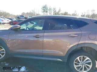 2016 Hyundai Tucson SE with VIN KM8J3CA4XGU063653, listed as a IAAI auction lot 41622270 with 103,270 mi miles. Bid and sale history available at carsss.com. Image 14.