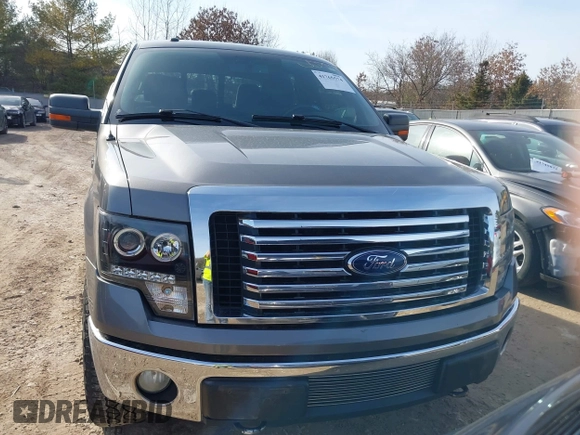 2011 Ford F-150 XLT with VIN 1FTFW1ET7BFC47792, listed as a IAAI auction lot 41765574 with 174,001 mi miles. Bid and sale history available at carsss.com. Image 12.