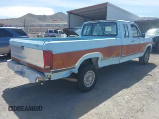 1986 Ford F-150 with VIN 1FTEX14N8GKA92289, listed as a IAAI auction lot 42089084 with 33,539 mi miles. Bid and sale history available at carsss.com. Image 4.