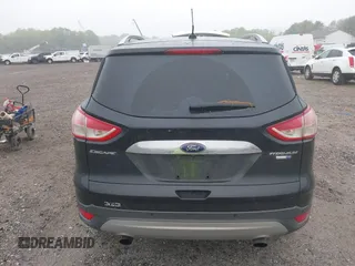 2014 Ford Escape Titanium with VIN 1FMCU9J90EUC24898, listed as a IAAI auction lot 42166523 with 152,464 mi miles and . Bid and sale history available at DreamBid. Image 16.