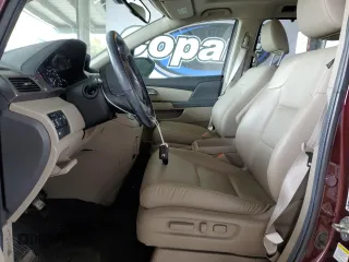 2014 Honda Odyssey EX-L with VIN 5FNRL5H66EB062435, listed as a Copart auction lot 53743445 with 103,849 mi miles and Salvage Title. Bid and sale history available at DreamBid. Image 7.