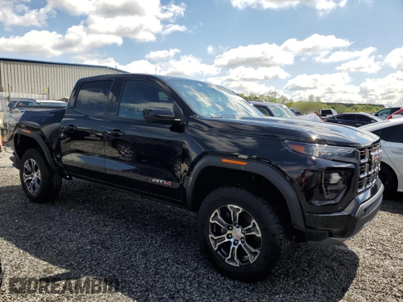 2023 GMC Canyon 4WD AT4 with VIN 1GTP6DEK9P1151776, listed as a Copart auction lot 52977805 with 11,750 mi miles and Salvage Title. Bid and sale history available at carsss.com. Image 4.