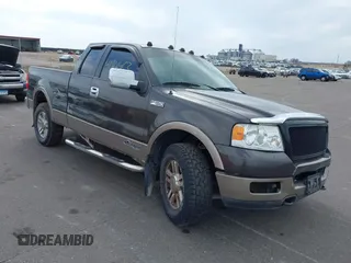 2005 Ford F-150 XLT with VIN 1FTPX14515NA43732, listed as a IAAI auction lot 41901453 with 216,729 mi miles. Bid and sale history available at carsss.com. Image 1.