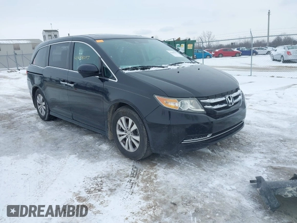 2015 Honda Odyssey EX-L with VIN 5FNRL5H60FB018030, listed as a IAAI auction lot 41608357 with 166,214 mi miles and . Bid and sale history available at carsss.com. Image 1.