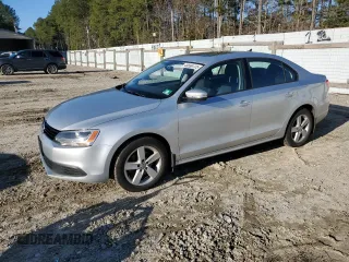 2012 Volkswagen Jetta TDI w/Premium с VIN 3VWLL7AJ2CM027607, выставлен на аукционе Copart как лот 49590725 с пробегом 107 466 миль миль и Списание • Salvage title. История ставок и продаж доступна на DreamBid. Изображение 1.
