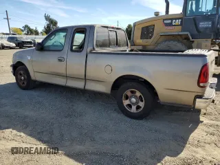 2003 Ford F-150 XL with VIN 1FTRX17L93NB77050, listed as a Copart auction lot 77107564 with 0 mi miles and Salvage Title. Bid and sale history available at carsss.com. Image 2.