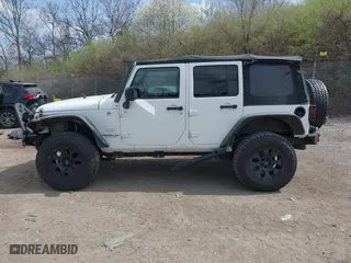2012 Jeep Wrangler Unlimited Sahara with VIN 1C4BJWEG9CL220965, listed as a IAAI auction lot 41902295 with 120,492 mi miles. Bid and sale history available at carsss.com. Image 15.
