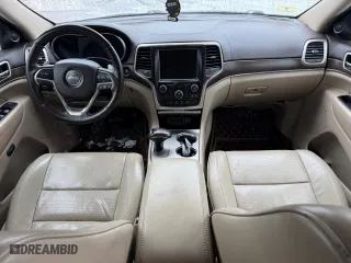2014 Jeep Grand Cherokee Overland with VIN 1C4RJFCM1EC298621, listed as a Copart auction lot 54796775 with 142,491 mi miles and Clean Title. Bid and sale history available at carsss.com. Image 9.