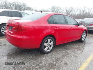 2012 Volkswagen Jetta Sedan TDI with VIN 3VW3L7AJ1CM333438, listed as a IAAI auction lot 41711918 with 105,212 mi miles. Bid and sale history available at carsss.com. Image 4.