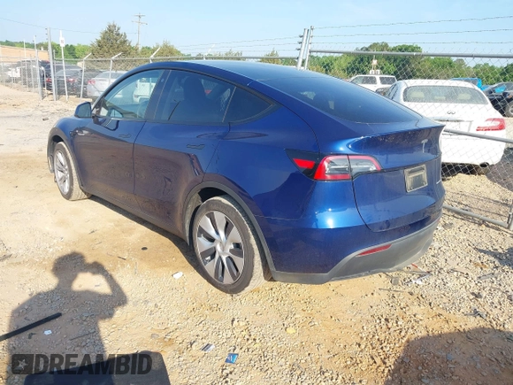 2023 Tesla Model Y Long Range with VIN 7SAYGDEE3PA114256, listed as a IAAI auction lot 42158307 with 19,975 mi miles and . Bid and sale history available at DreamBid. Image 3.