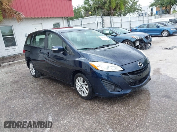 2014 Mazda 5 Sport with VIN JM1CW2BL6E0169672, listed as a IAAI auction lot 42422459 with 212,179 mi miles and . Bid and sale history available at DreamBid. Image 1.